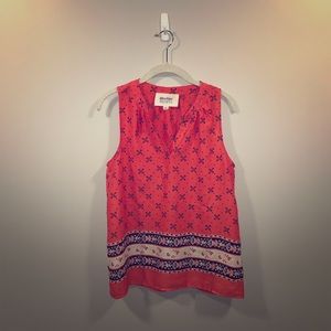 Coral printed shirt.